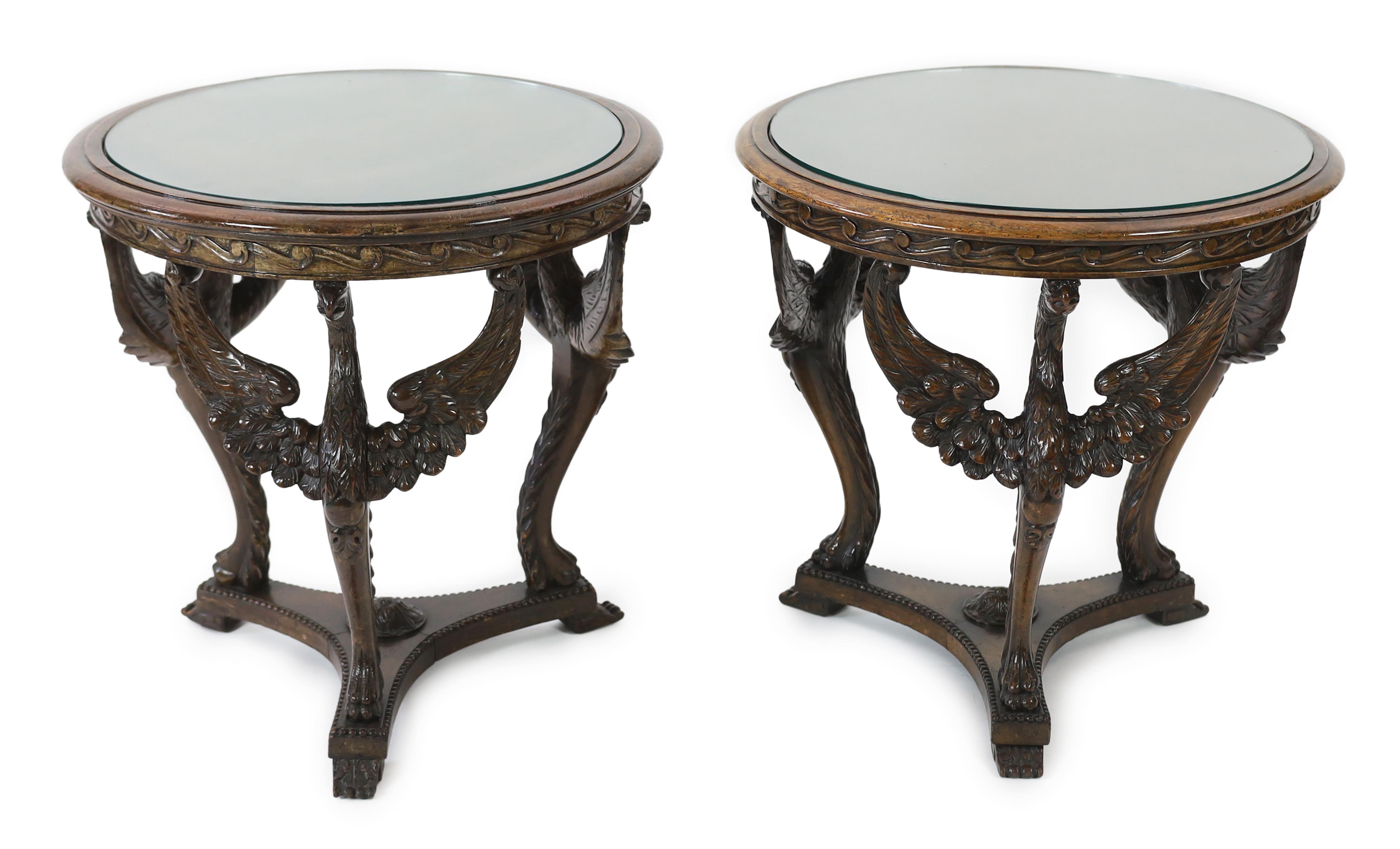 A pair of walnut occasional tables